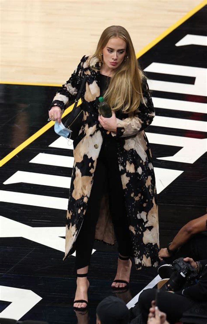 Adele Is Stylish In Fitted Leggings & Sandals At NBA Final After 100 Lb. Weight Loss