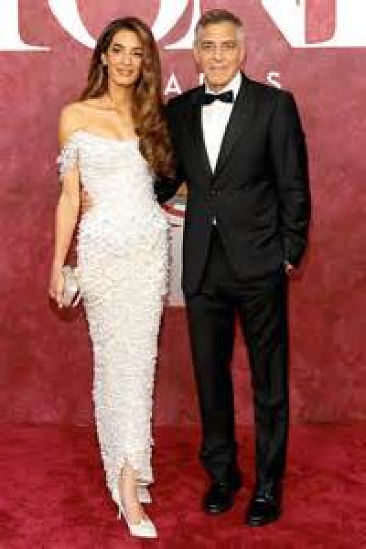 Amal Clooney Stuns In Cutout Dress As She Cozies Up To A Handsome George On The Red Carpet — Photo