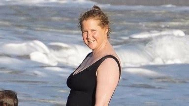 Amy Schumer Rocks Plunging Swimsuit As She Kisses Husband: Photos – Hollywood Life