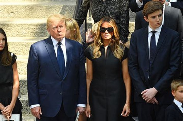 Barron Trump Towers Over Donald & Melania At Ivana’s Funeral: Photo – Hollywood Life