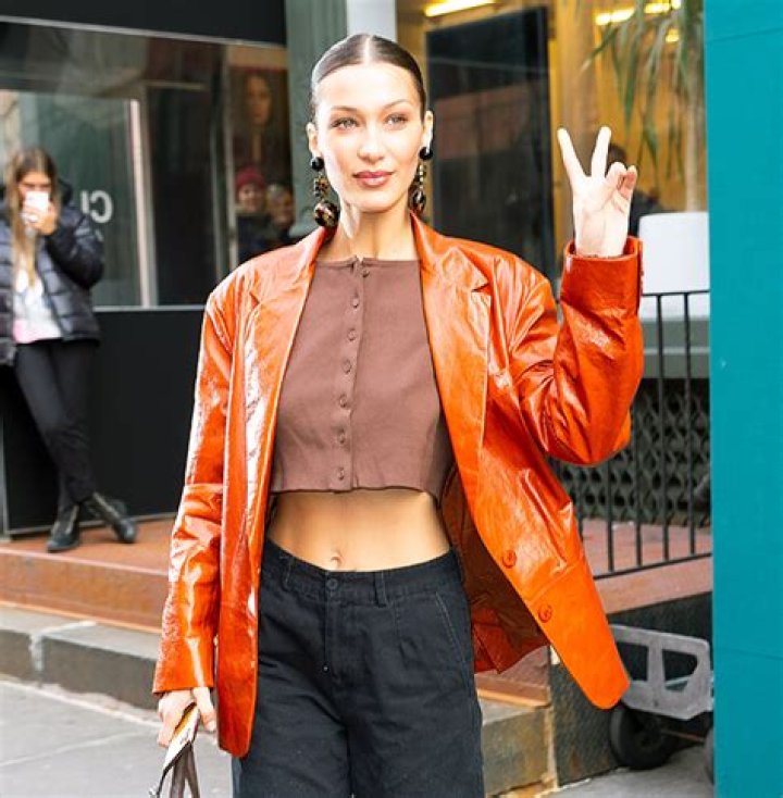 Bella Hadid Fires Back At Hater Who Says She Looks ‘Tired’ In New Pics: ‘I’m Sorry That My Bags Offend You’