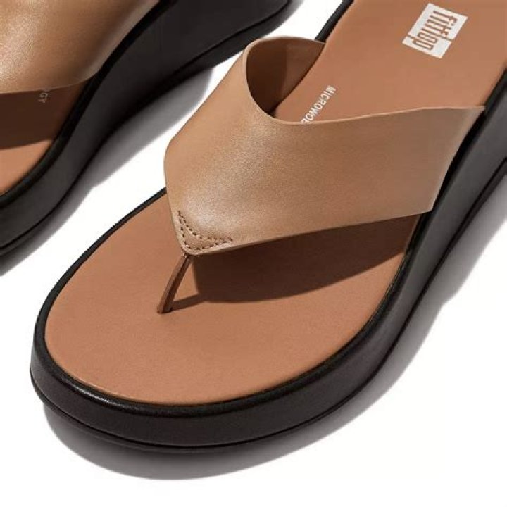 7 Comfortable & Stylish Flip-Flops To Wear To The Beach This Summer