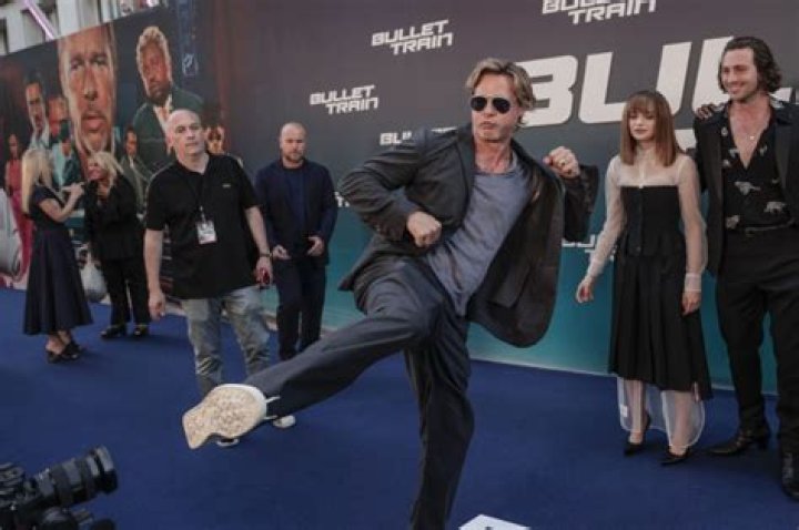 Brad Pitt Does Epic Karate Kick On Red Carpet At ‘Bullet Train’ Paris Premiere: Photos