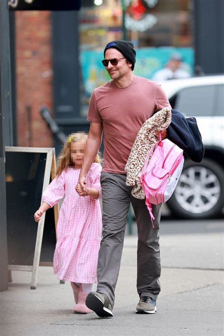 Bradley Cooper’s Daughter Lea, 5, Is A Princess In Pink As She Holds Dad’s Hand: Photos
