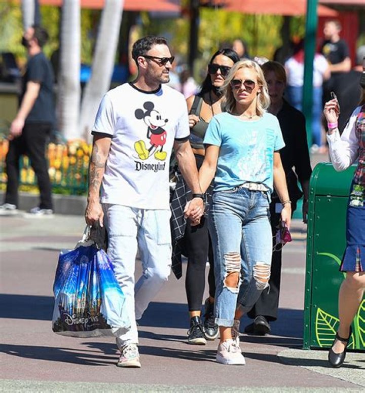 Brian Austin Green & Sharna Burgess Hold Hands As They Stroll Through Disneyland — Photos