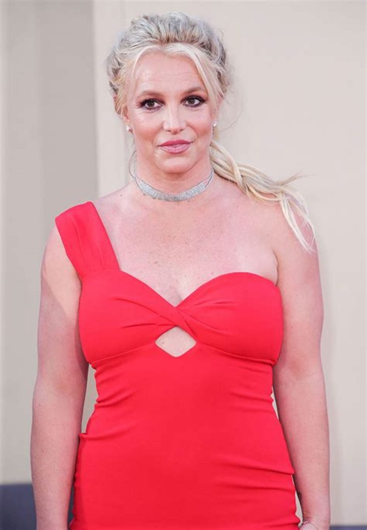 Britney Spears Is Red Hot In Nothing But Bikini Bottoms & Boots For Sexy New Photo