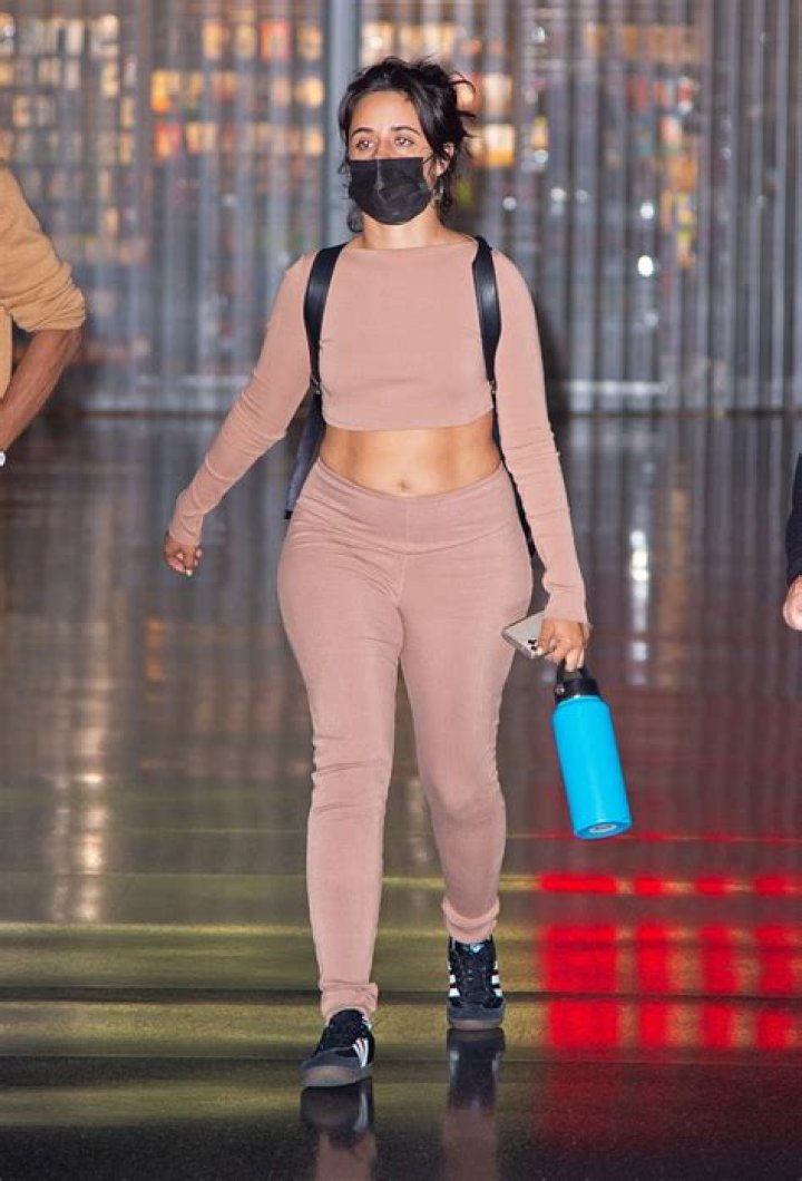 Camila Cabello Steps Out In Crop Top & Matching Fitted Leggings In NYC After ‘Cinderella’ Premiere
