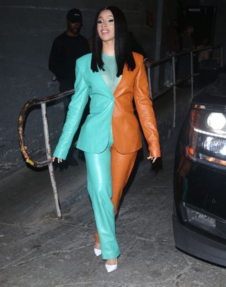 Gigi Hadid, Cardi B & 10 More Stars Wearing Two-Toned Suits For Fall — See Pics