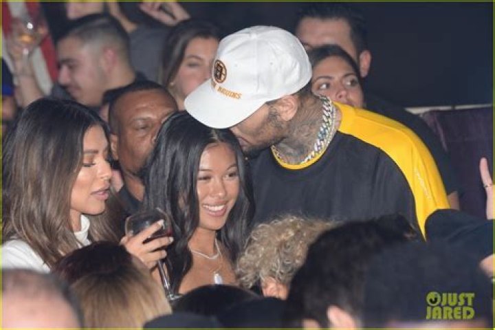 Chris Brown & Rumored Boo Ammika Harris Pack On The PDA At A Club In Paris – See Sexy Pics