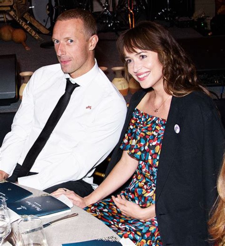 Dakota Johnson Steps Out With Chris Martin On Rare Date Night On Gwyneth Paltrow’s Birthday