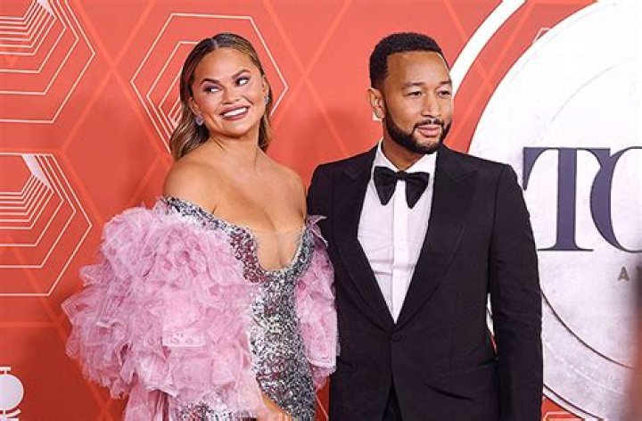 Chrissy Teigen & John Legend Give Newborn Daughter Esti Her ‘First Kiss’ In Cute Video: Watch