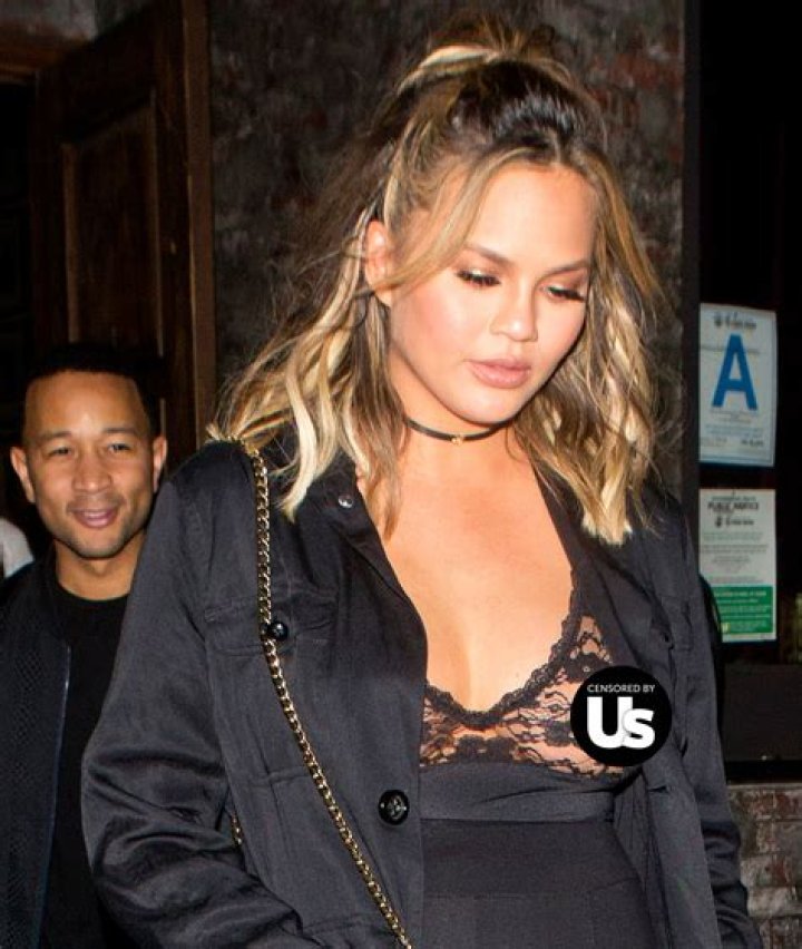 Chrissy Teigen Rocks Lacy Silk Top & High Waisted Short Shorts In Gorgeous New Pics