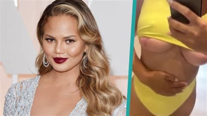 Chrissy Teigen Bares All 6 Months After Removing Breast Implants As She Celebrates NYE In The Caribbean