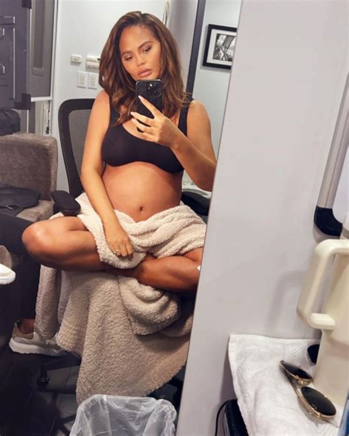 Pregnant Chrissy Teigen Debates Waxing ‘Down There’ In Third Trimester, Wonders If It’s ‘Painful’