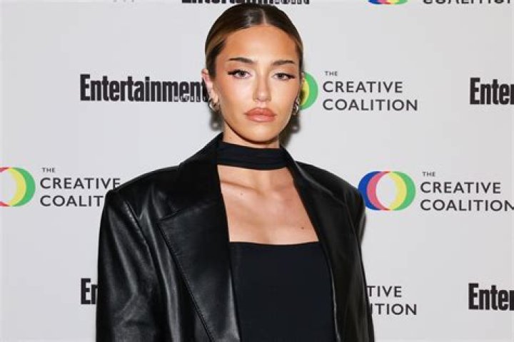 Delilah Hamlin Rocks Lingerie & Packs On The PDA With BF Eyal Booker In Steamy ‘Paper’ Shoot