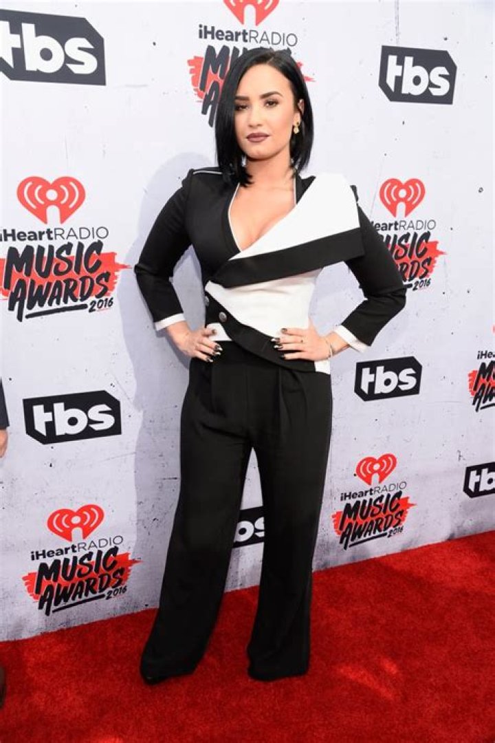 Demi Lovato Stuns In Blue Velvet Pantsuit At 2021 iHeartRadio Music Awards After Coming Out As Non-Binary