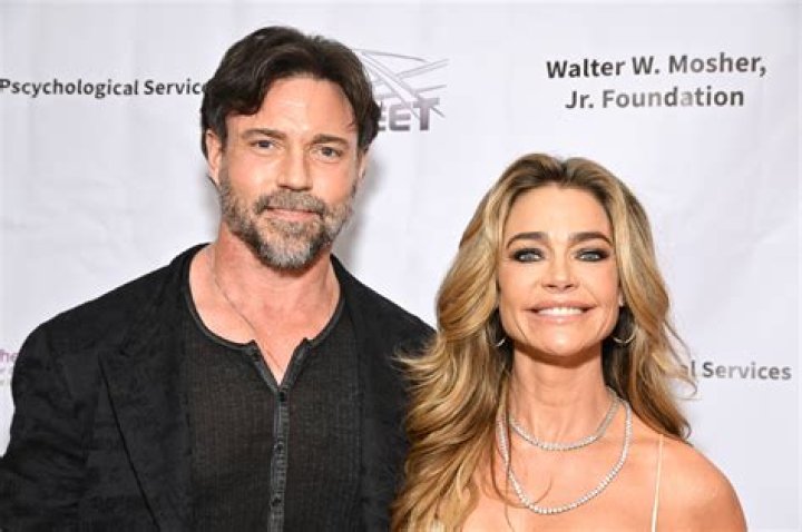 Denise Richards & Hubby Aaron Phypers Makeout While On Dinner Date — See PDA Pic