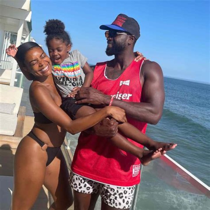 Gabrielle Union, 47, Stuns In A Blue Bikini While Cuddling Up To Husband Dwyane Wade By The Pool