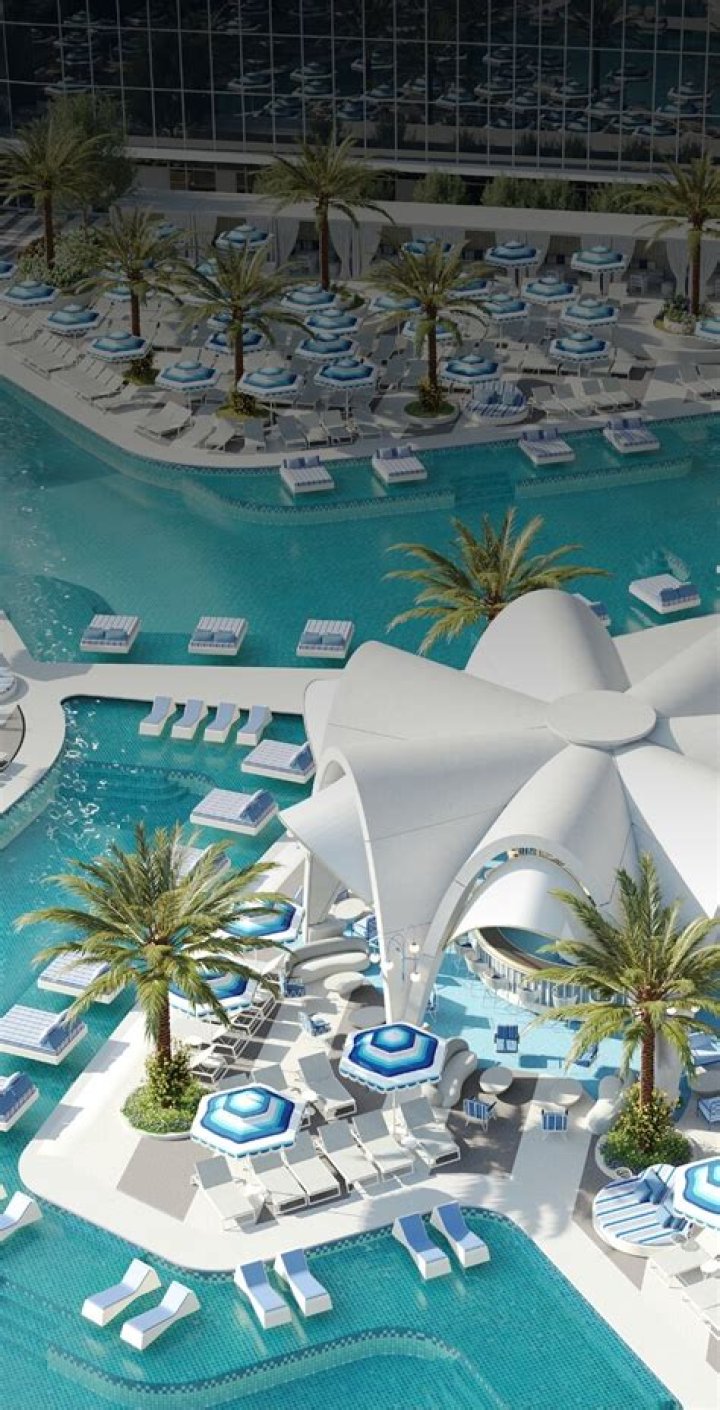 Gabrielle Union Wears Striped Bikini While Posing In A Pool — Pics – Hollywood Life