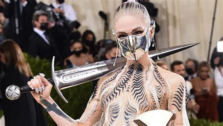 Grimes Shares Wild Throwback Pic From Her Teen Years After Debuting New Makeover