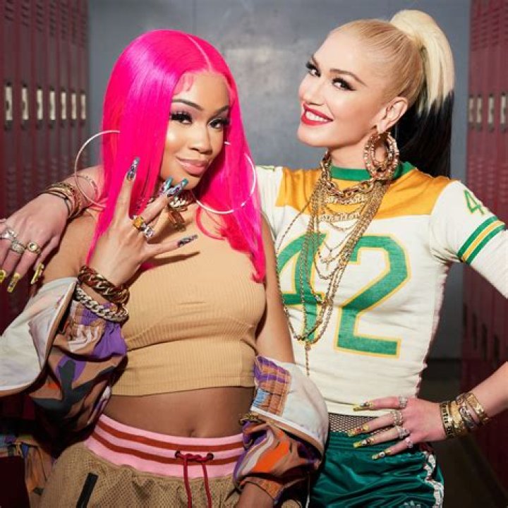 Gwen Stefani Invites Saweetie To Throw It Back To Her Y2K Era In ‘Slow Clap (Remix)’ Video