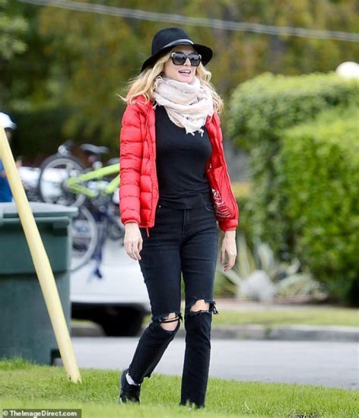 Heather Graham, 50, Looks Half Her Age In Jeans & Cosy Gear Out For A Brisk Walk — Pic
