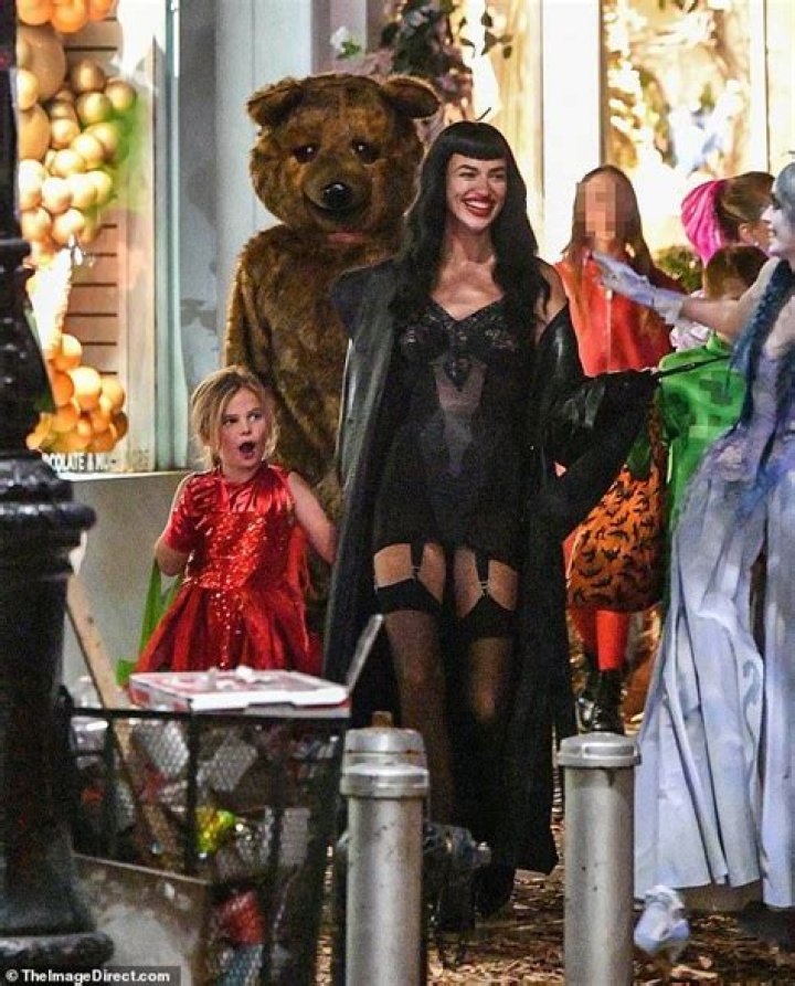 Irina Shayk Sits On Bradley Cooper’s Lap As He Rocks Bear Costume Amid Speculation They’ve Reunited