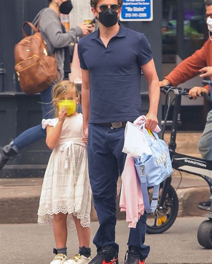 Irina Shayk Stuns Poolside In A Neon Thong Bikini Amid Claims She & Kanye West Are Still ‘Dating’