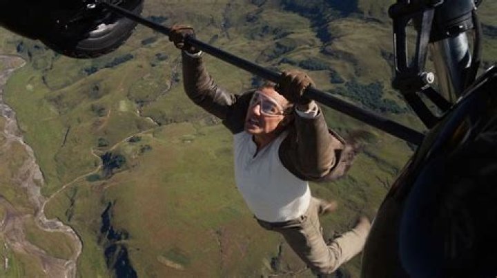 Jay Leno, 71, Hangs Out Of A Moving Plane During Insane Mid-Air Stunt — Watch