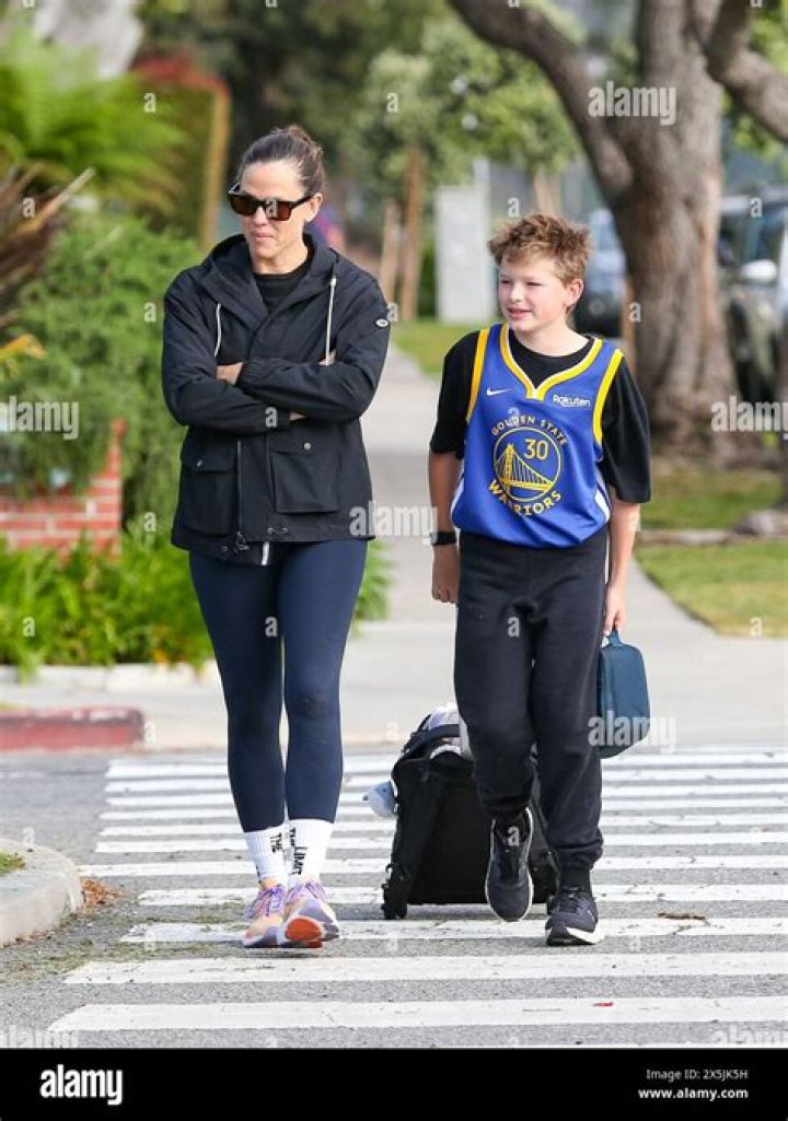 Jennifer Garner Holds 9-Year-Old Son Samuel’s Hand As She Picks Him Up From School