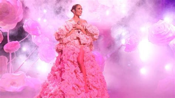 Jennifer Lopez Wows in Revealing Gown Adorned With Pink Roses During ‘SNL’ Performance