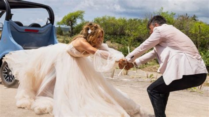 Jennifer Lopez’s Dress Is Caught On A Tire In ‘Shotgun Wedding’: Pics – Hollywood Life