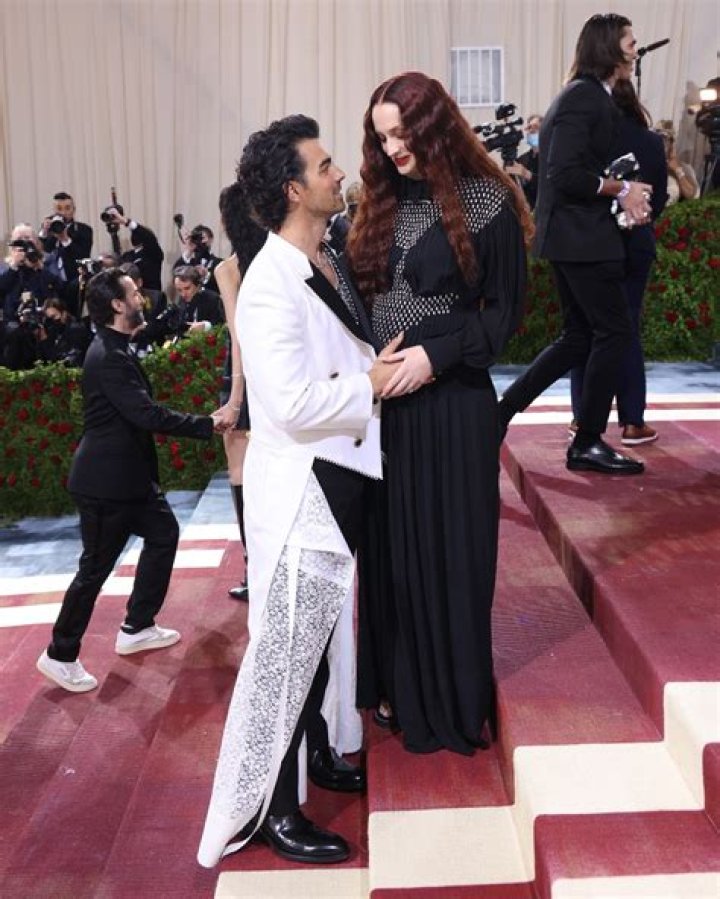 Sophie Turner Shows Off Baby Bump In Silver-Studded Black Gown With Joe Jonas At Met Gala