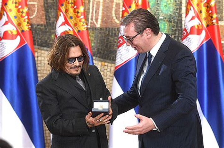 Johnny Depp Makes Rare Appearance After Losing Amber Heard Lawsuit To Receive Serbian Medal