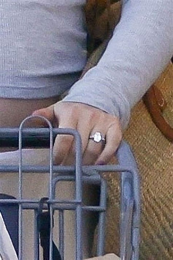 Jonah HIll’s Pregnant Fiancee Olivia Millar Shows Off Her Bare Baby Bump & Engagement Ring In New Photos