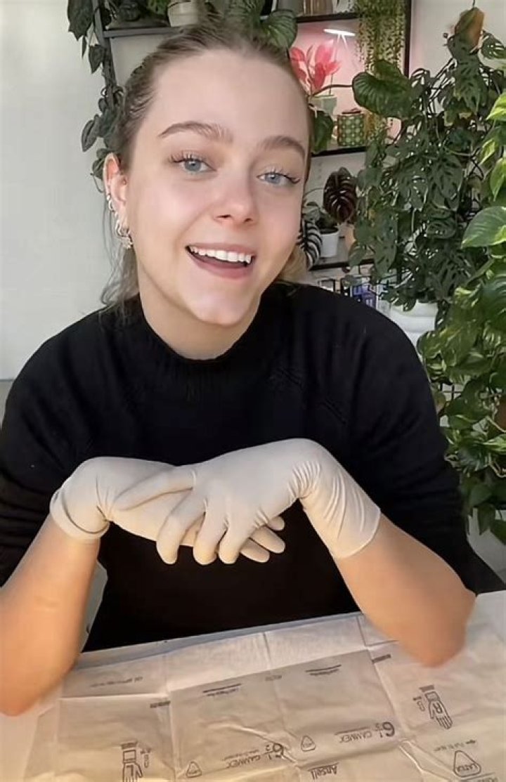 Jordyn Woods Slips On Latex Gloves For Sexy Hotel Bedroom Pics During G-Eazy Video Shoot