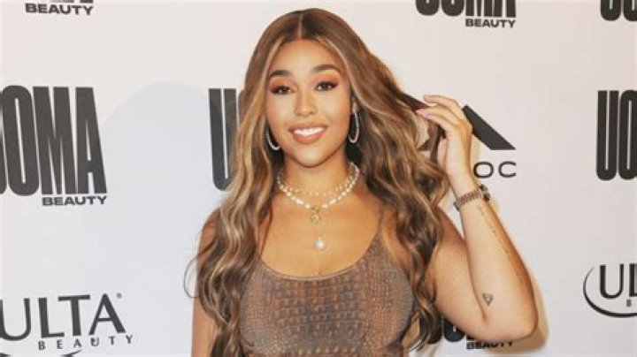 Jordyn Woods Rocks Skintight Dress & Reveals New Cryptic Arm Tattoo On Kylie Jenner’s Birthday – Pic