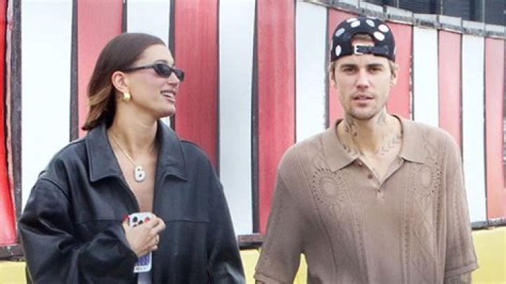 Justin Bieber Cradles Wife Hailey Bieber’s Baby Bump in New PDA Photo