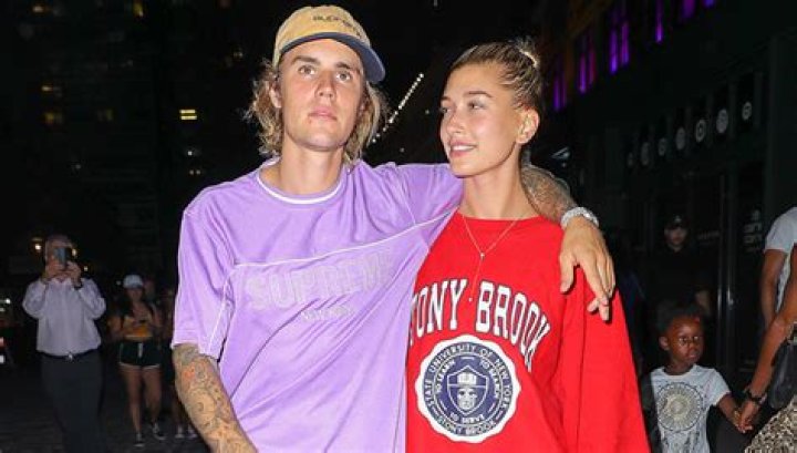Justin Bieber & Hailey Baldwin Look Like A ‘Normal, Happy’ Couple While Grocery Shopping In NYC