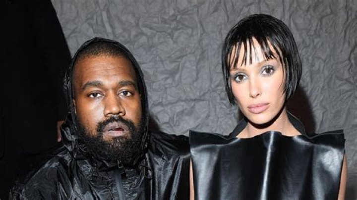 Kanye West’s Wife Bianca Censori Wears Cheeky White Bodysuit & Thigh-High Boots