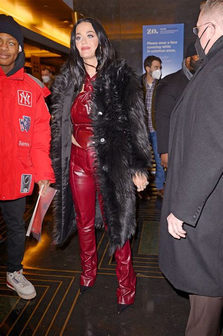 Katy Perry Rocks Sexy Burgundy Corset Top & Matching Bootleg Pants After ‘SNL’ Rehearsals