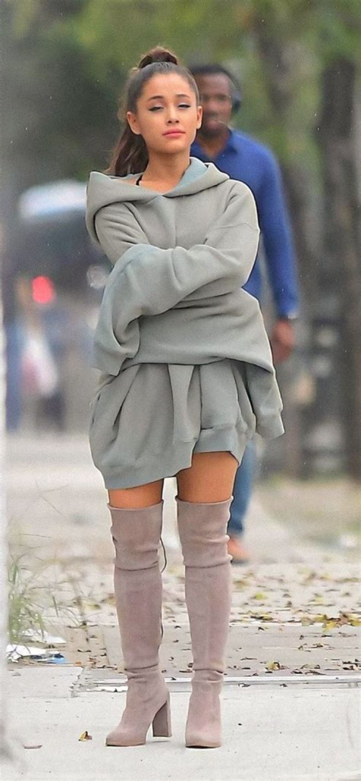 Khloe Kardashian Looks Identical To Kim In Tight Jumpsuit & Ariana Grande-Inspired Ponytail