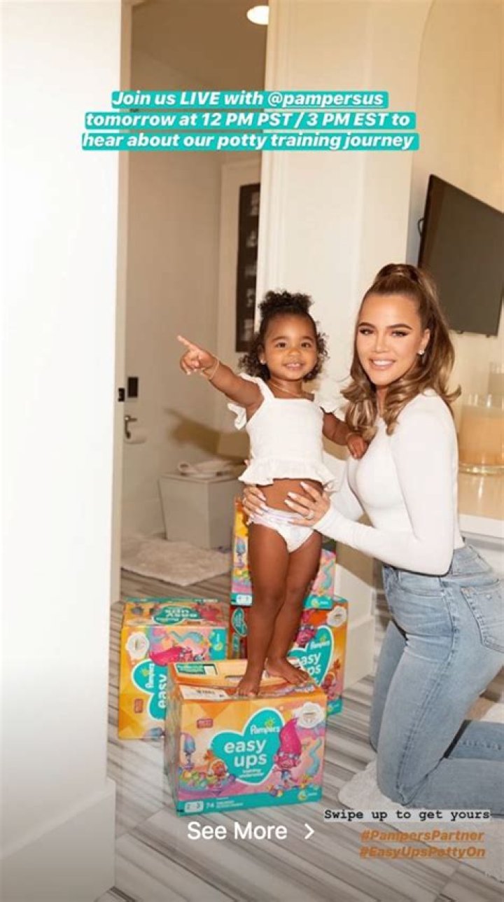 Khloe Kardashian & Adorable True Thompson, 2, Twin In Matching White Outfits in Pampers Pic