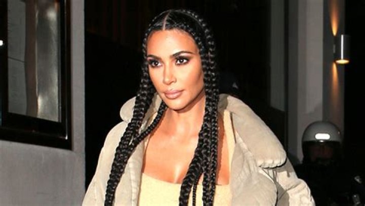 Kim Kardashian Rocks Crop Top & High Waisted Pants While Showing Off New KKW Lip Glosses