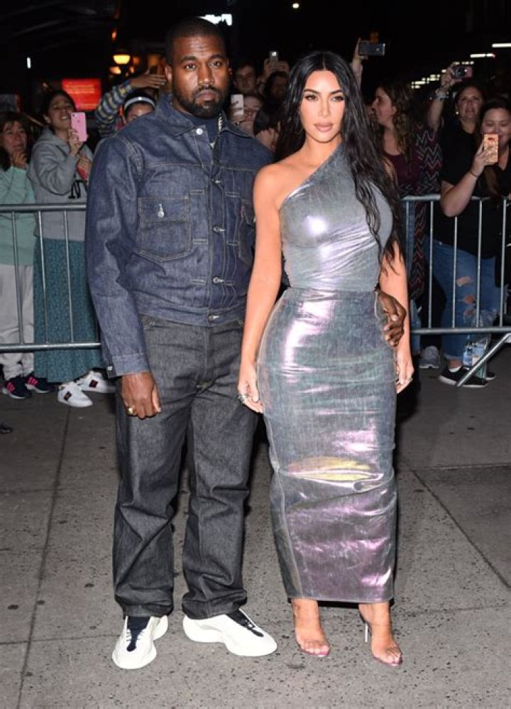 Kim Kardashian & Kanye West ‘Trying To Work Things Out’ After Her Wedding Dress Appearance