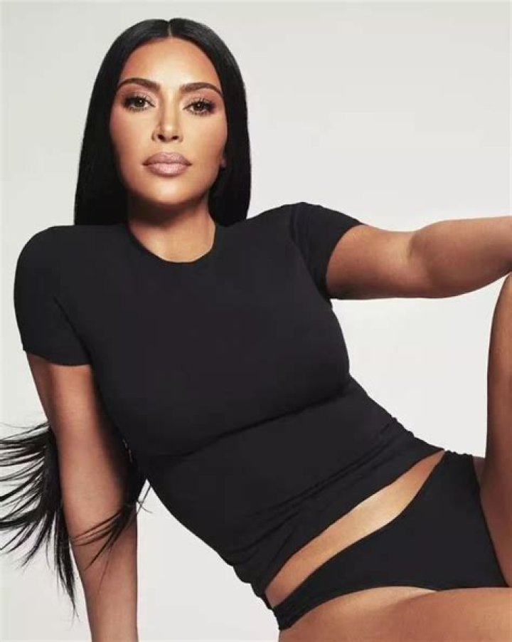 Kim Kardashian Stretches Out On Beach In New Figure Hugging Skin Tone SKIMS Body Wear — Pic
