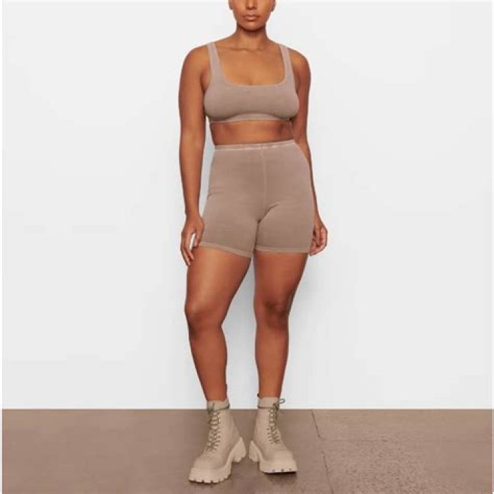 Kim Kardashian’s Tan Bralette & Biker Shorts For SKIMS – Photo – Hollywood Life