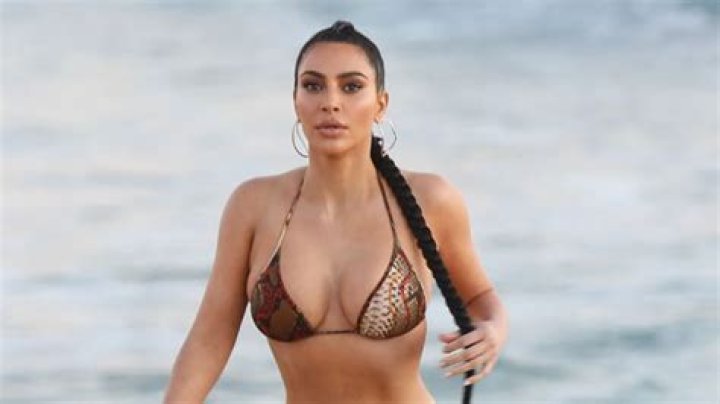 Kim Kardashian Slays In White Bikini For SKIMS Swim: Photos – Hollywood Life
