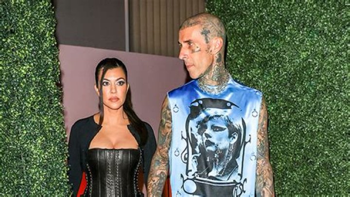 Kourtney Kardashian Cozies Up to Travis Barker Side Stage at Hardcore Concert: Watch