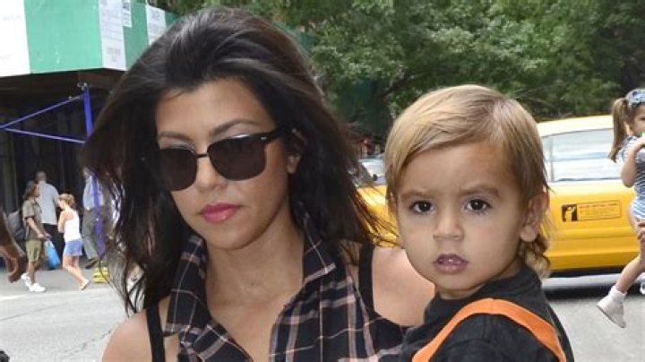 Kourtney Kardashian Lounges Poolside In Floral Bikini With Daughter Penelope In Italy — See Pics
